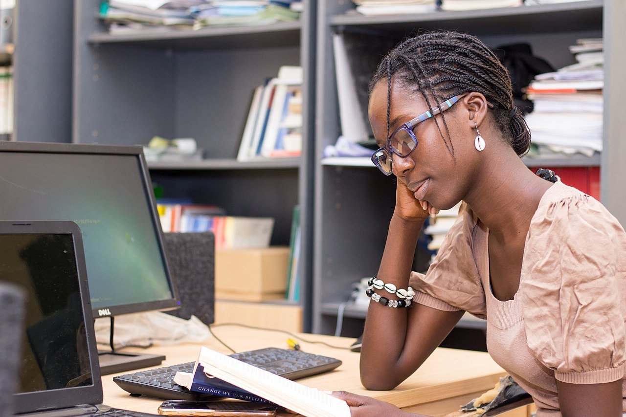 1280px-Worker_studying.jpg